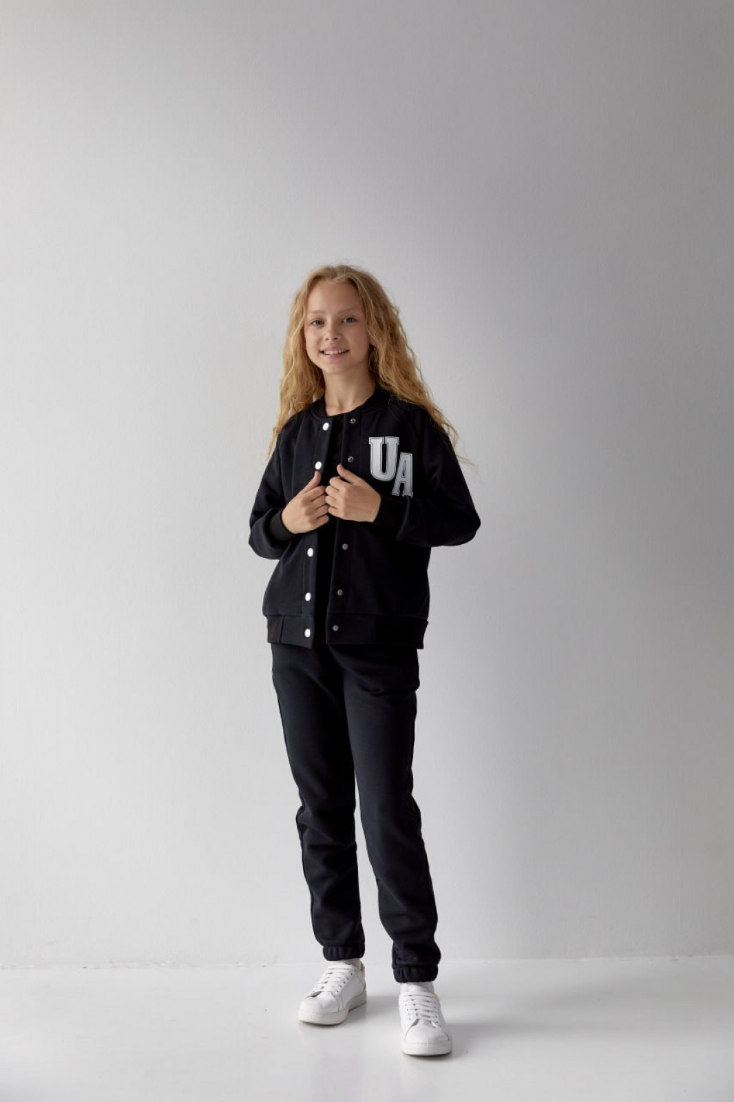 Дитячий костюм бомбер та джогери для дівчинки колір чорний р.152 441771