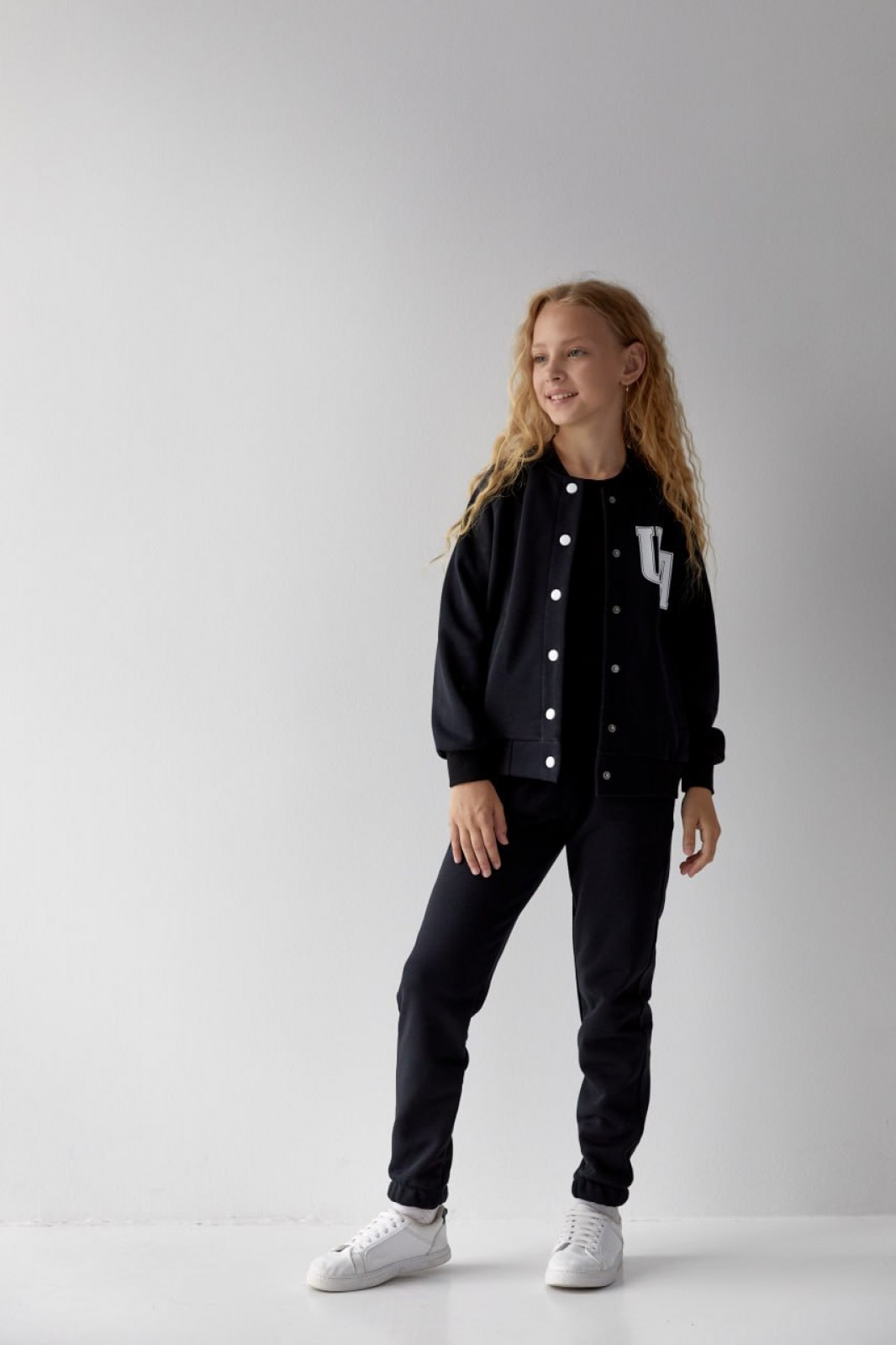 Дитячий костюм бомбер та джогери для дівчинки колір чорний р.146 441769