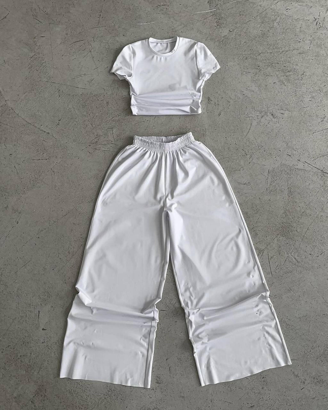 Жіночий  костюм топ і штани палаццо колір білий р.46/48 452630