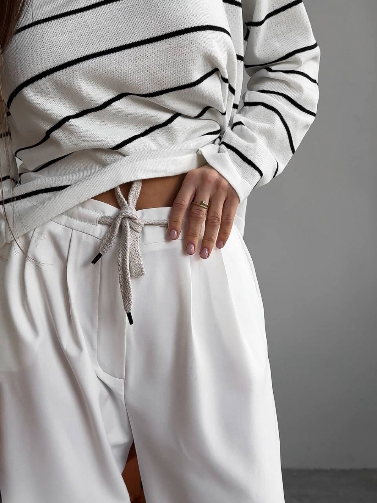 Жіночі брюки з декоративним шнурком колір молочний р.44 451523