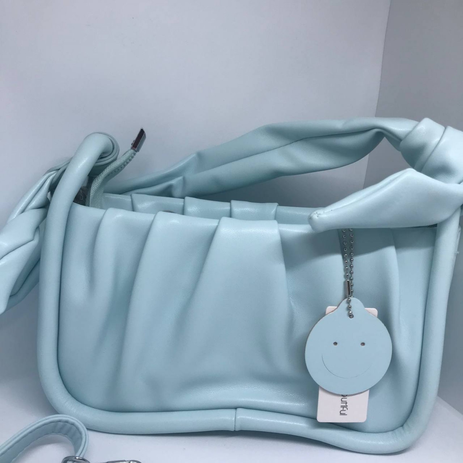 Жіноча сумочка з ремінцем колір блакитний 435842