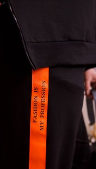 Жіночий спортивний костюм колір чорний з помаранчевим р.50/54 450799