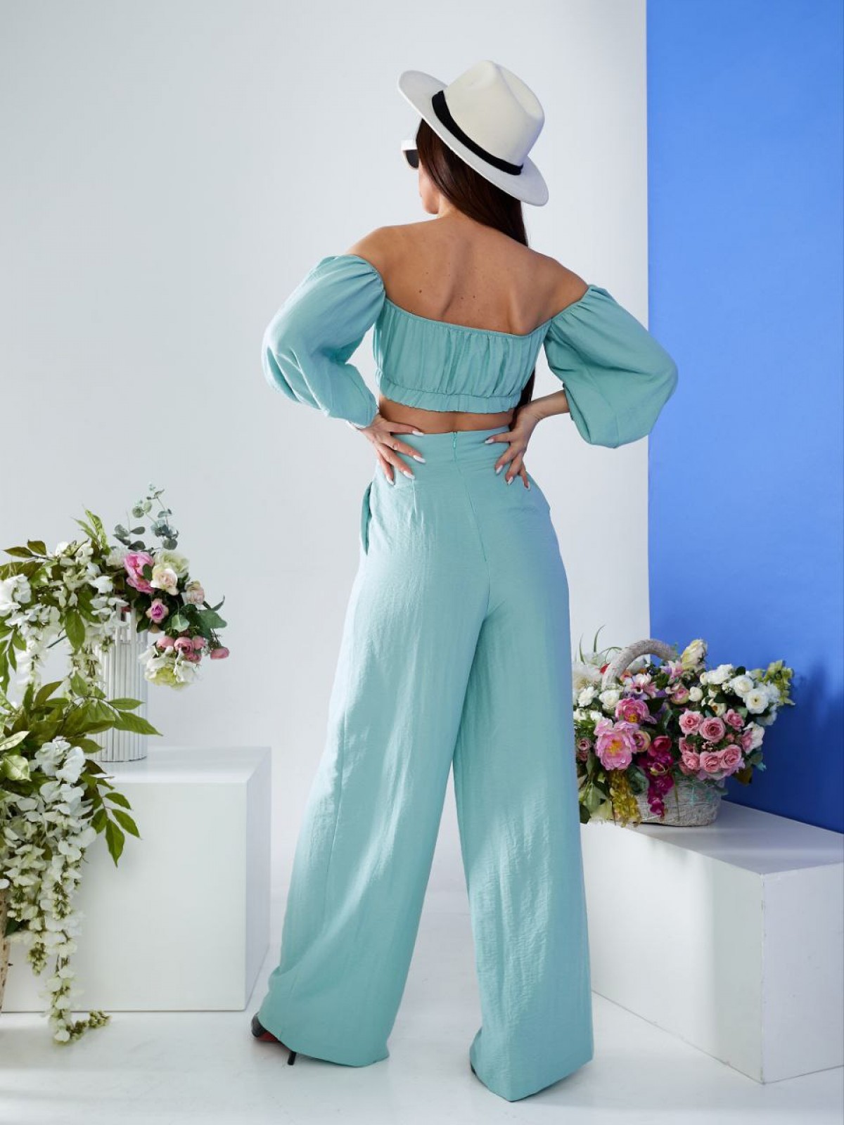 Жіночий  костюм топ і штани палаццо оливкового кольору 387262