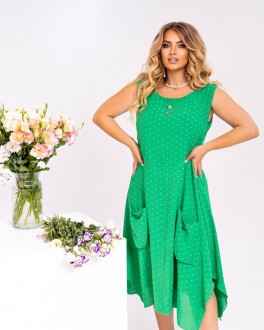 Жіноча вільна сукня прикрашена декоративними кишенями з ґудзиком зеленого кольору р.62/64 435597