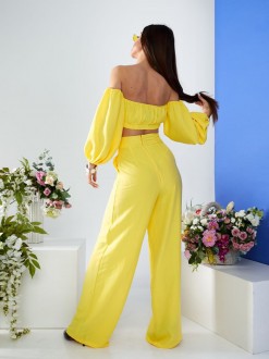 Жіночий  костюм топ і штани палаццо жовтого кольору р.XS 387271