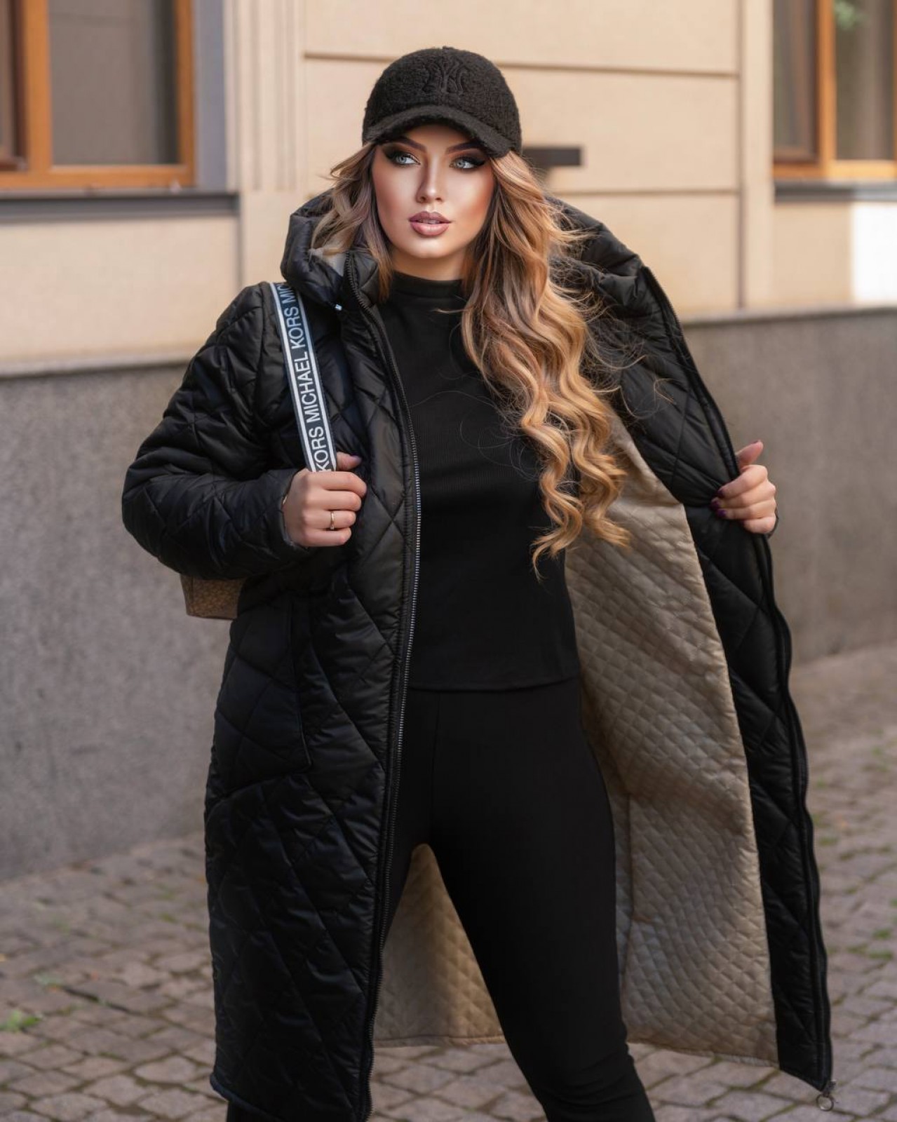 Жіноче зимове пальто чорний ромб розмір 54/56 386144